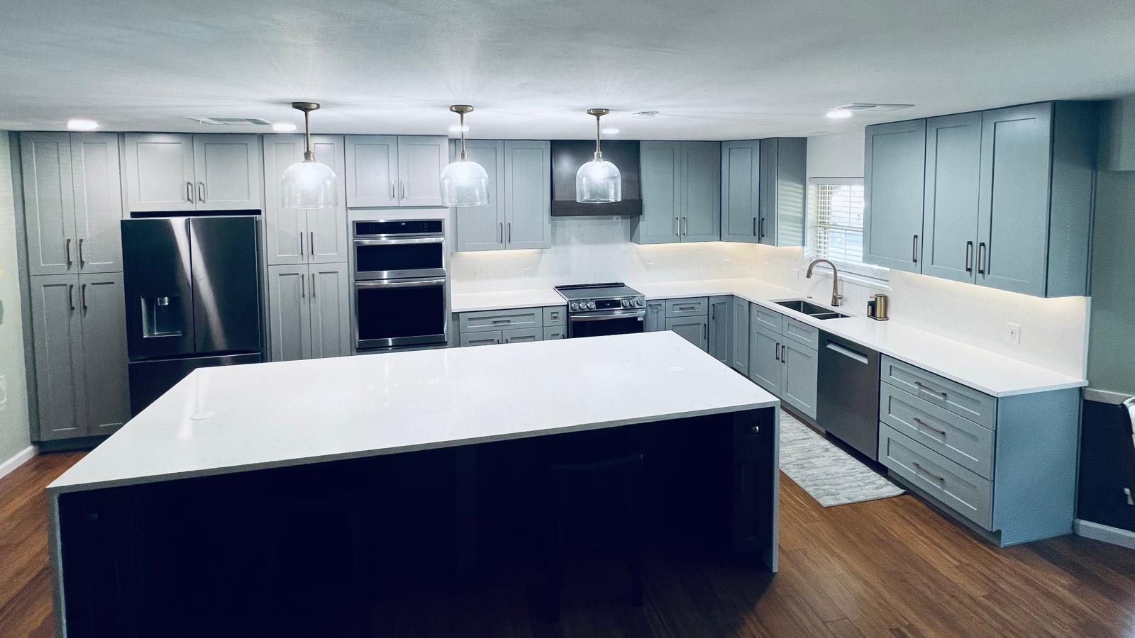 Gray cabinet kitchen with large island San Antonio